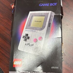 Nintendo Game Boy with Pink Buttons and Gray Case